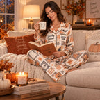 woman holding hello pumpkin mug in halloween printed pajama set