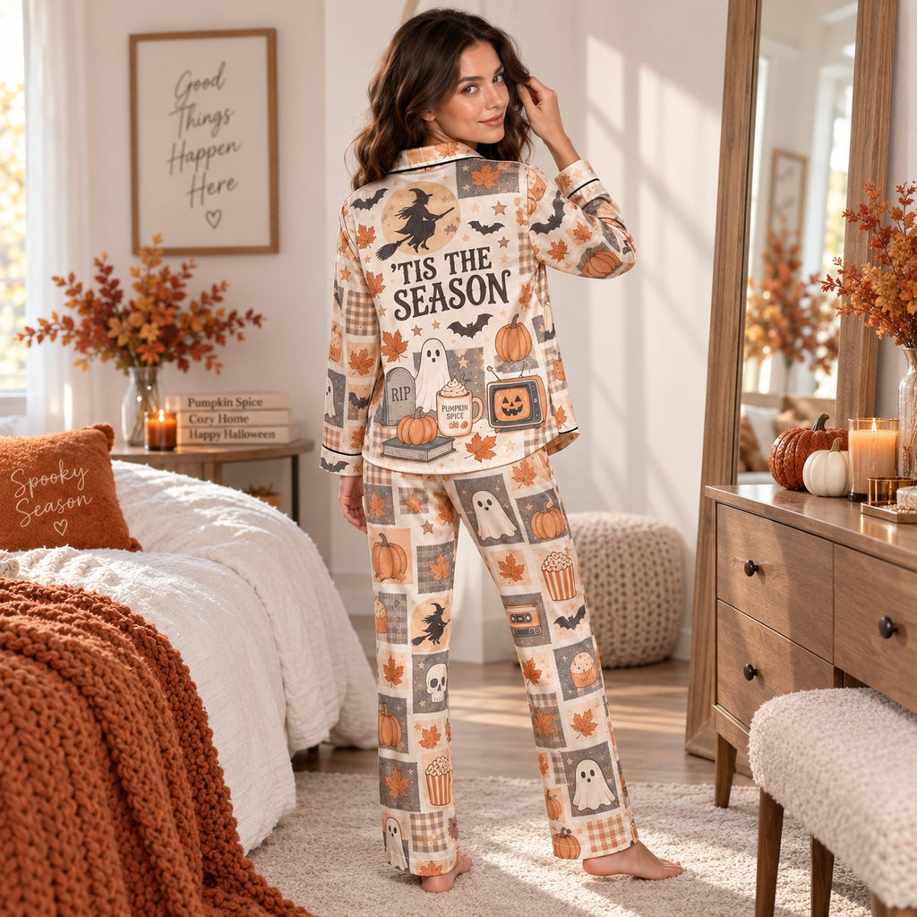 close up of woman reading book in spooky season satin pajamas
