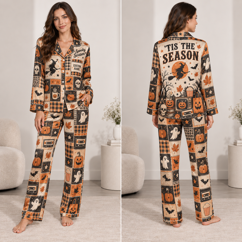 woman modelling a halloween satin pajama set with pumpkin and ghost print