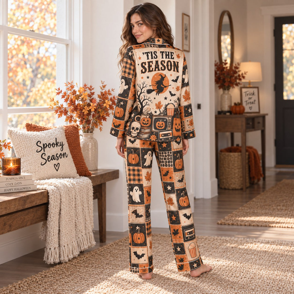 woman lounging on a couch wearing a custom name halloween satin pajama