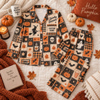 orange patchwork pumpkin satin pajamas flat lay with a custom name on the chest