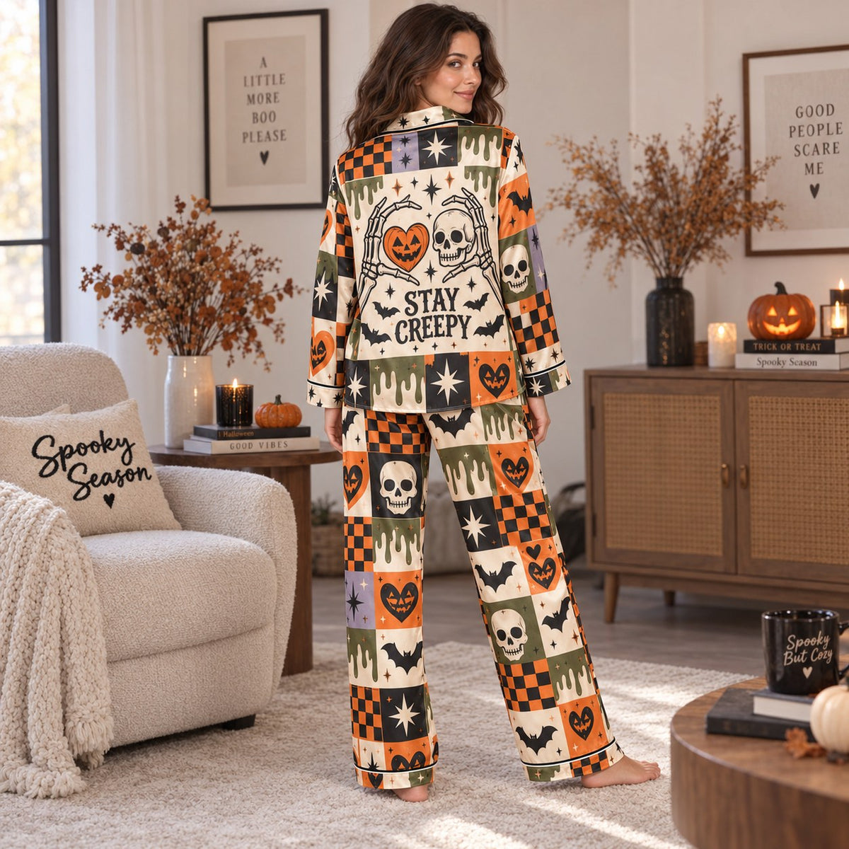 woman holding witch better coffee mug in halloween satin pajama set