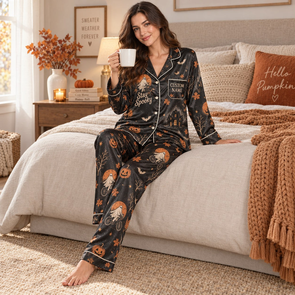 back view of stay spooky halloween satin pajamas with pumpkin moon