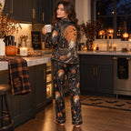 kitchen flat lay of stay spooky halloween pajamas with pumpkins