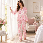 woman in pink breast cancer awareness pajamas sitting