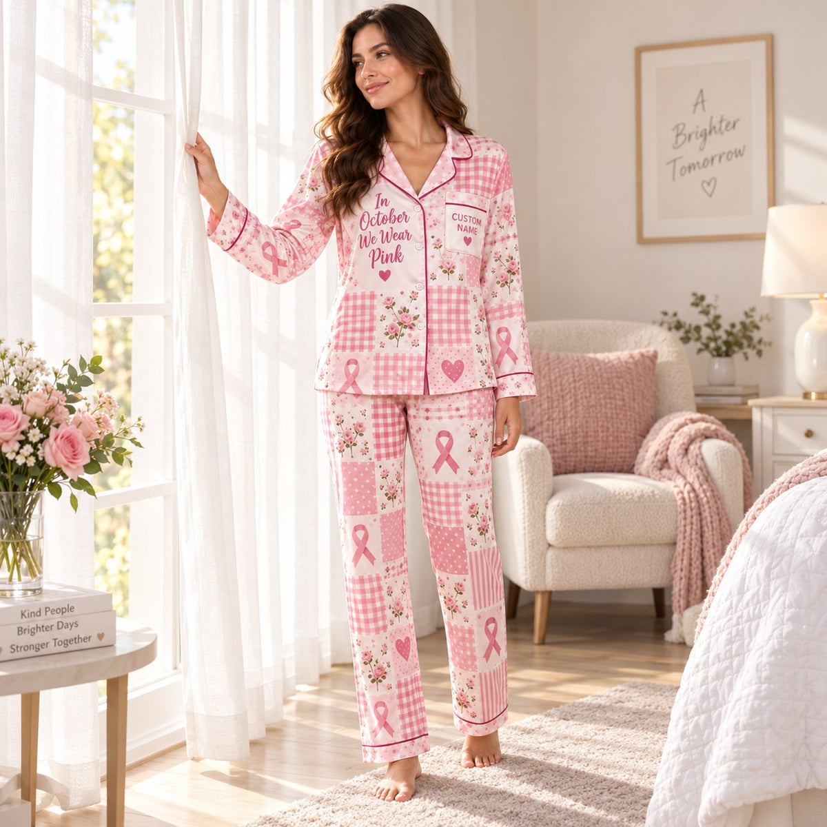 woman in pink breast cancer awareness pajamas sitting