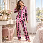 woman sitting on bed in pink and black breast cancer support squad