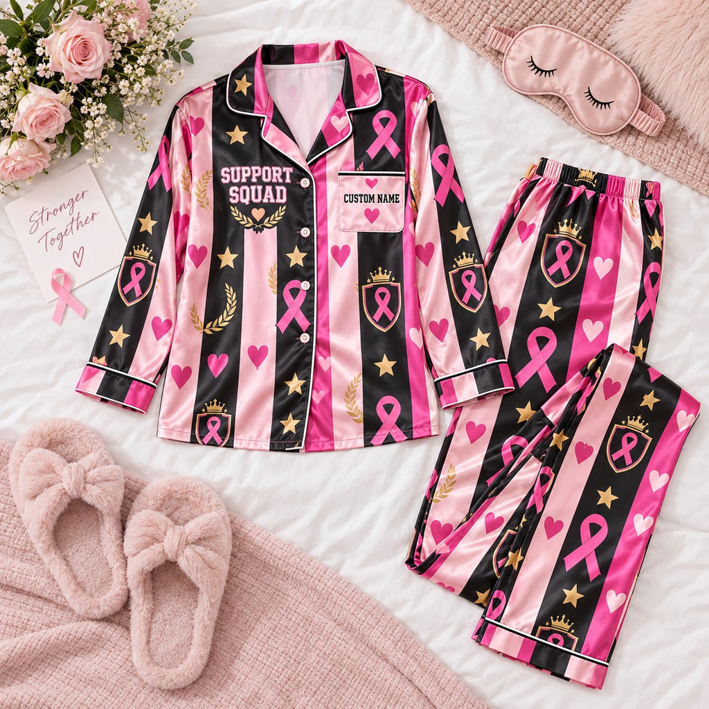 pink ribbon striped satin pajamas flat lay with a custom name on the chest