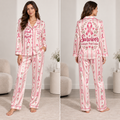 satin pajama set with pink stripes and pink ribbon survivor design worn