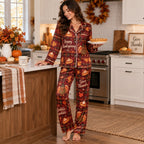 woman holding a pie in kitchen wearing red satin thanksgiving pyjamas