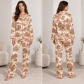 satin pajama set in thanksgiving turkey and pumpkin print, model standing