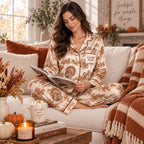 model in thanksgiving pajamas holding a hello fall mug