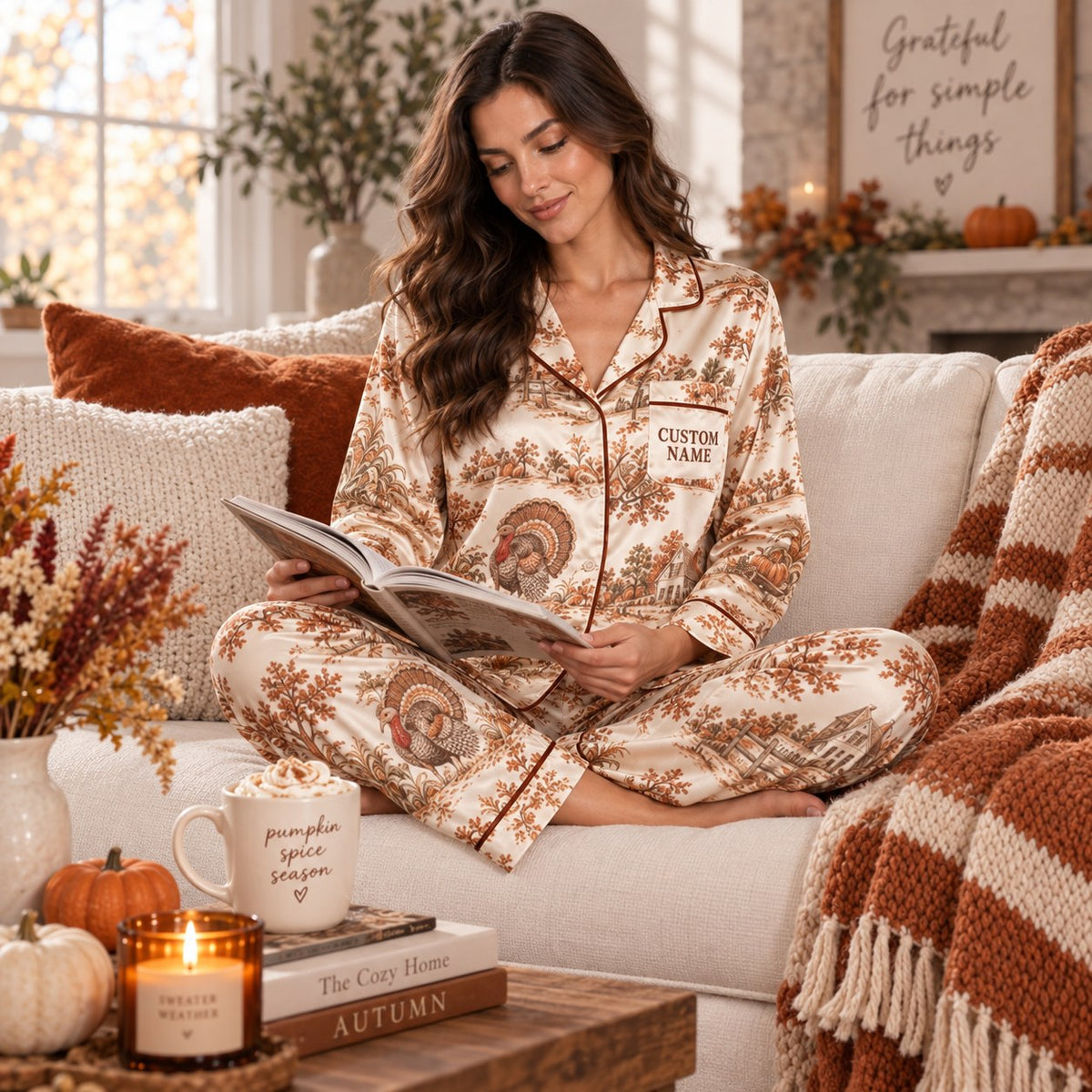 model in thanksgiving pajamas holding a hello fall mug