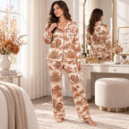 woman reading a book on a couch wearing personalized thanksgiving satin pajamas