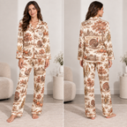 woman wearing a beige toile thanksgiving satin pajama set