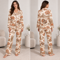 woman wearing thanksgiving turkey and pumpkin satin pajama set