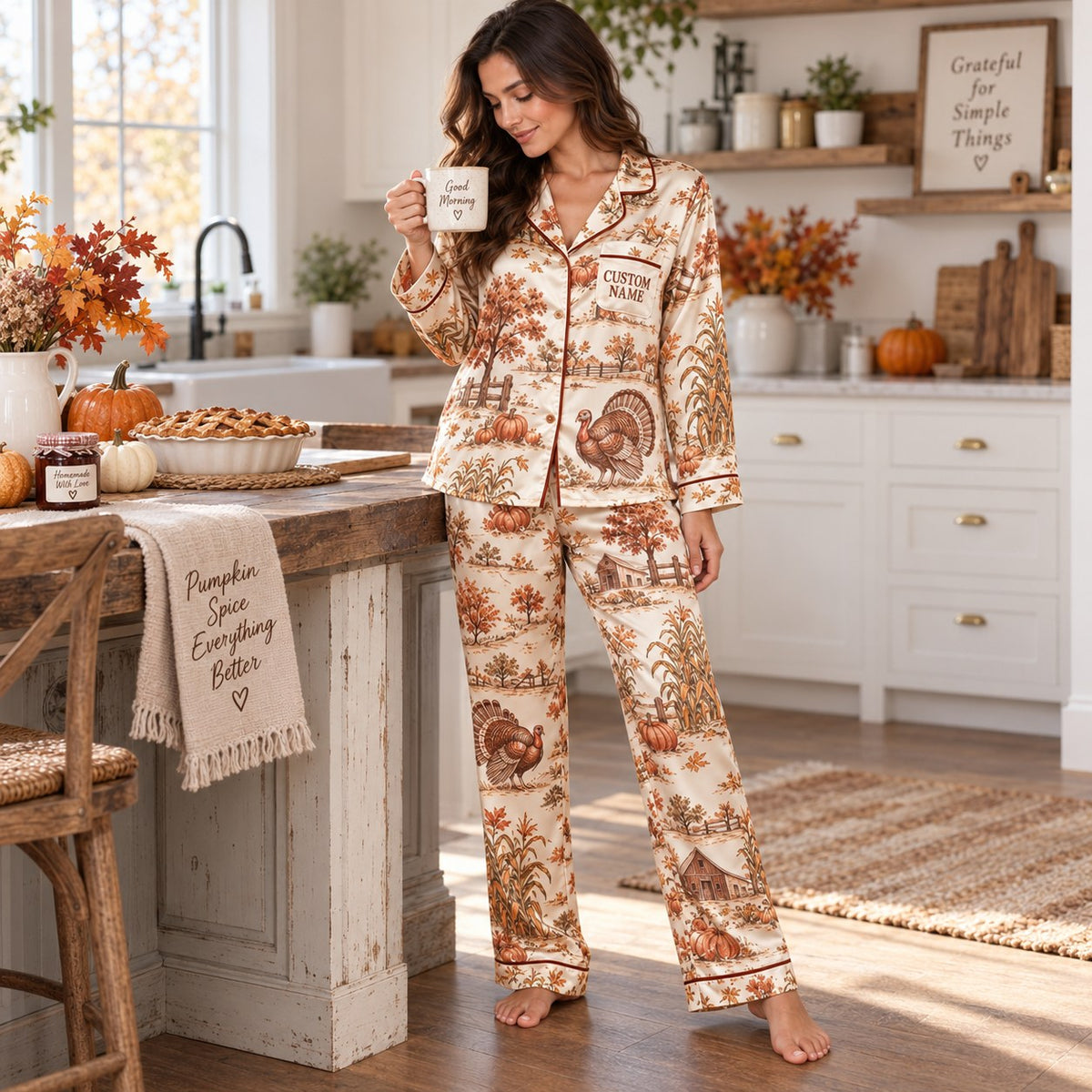 woman sitting on a bed holding a good morning mug in thanksgiving