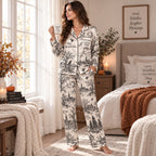 woman reading a book in halloween toile satin pajamas
