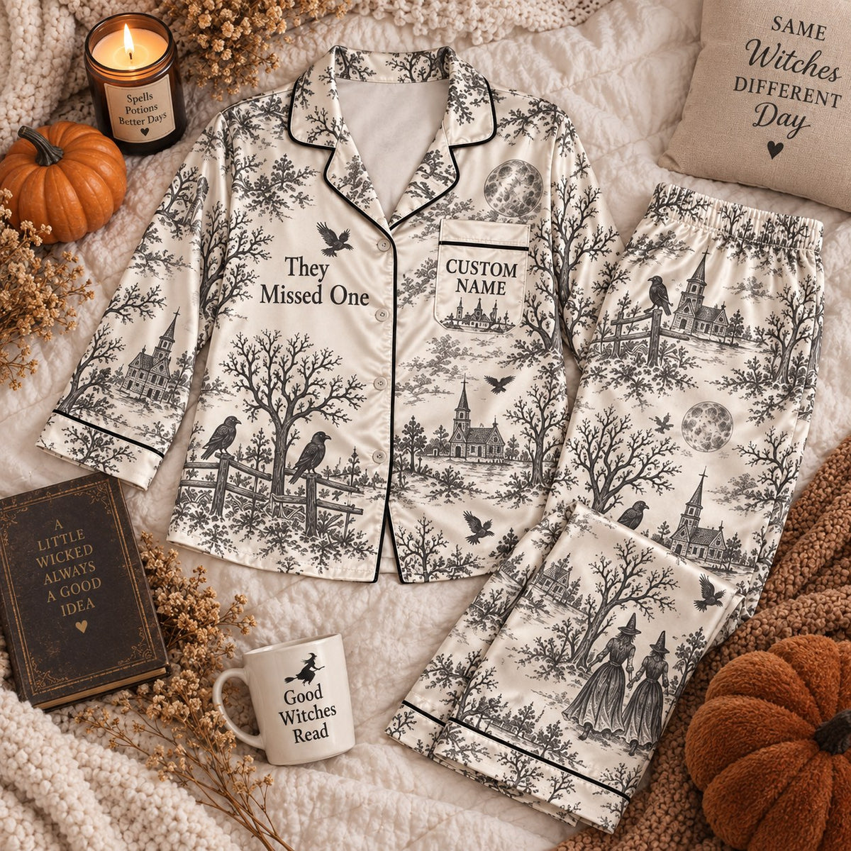 raven toile print satin pajamas flat lay with a custom name on the chest