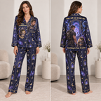 woman modelling a navy cosmic cat satin pajama set front view