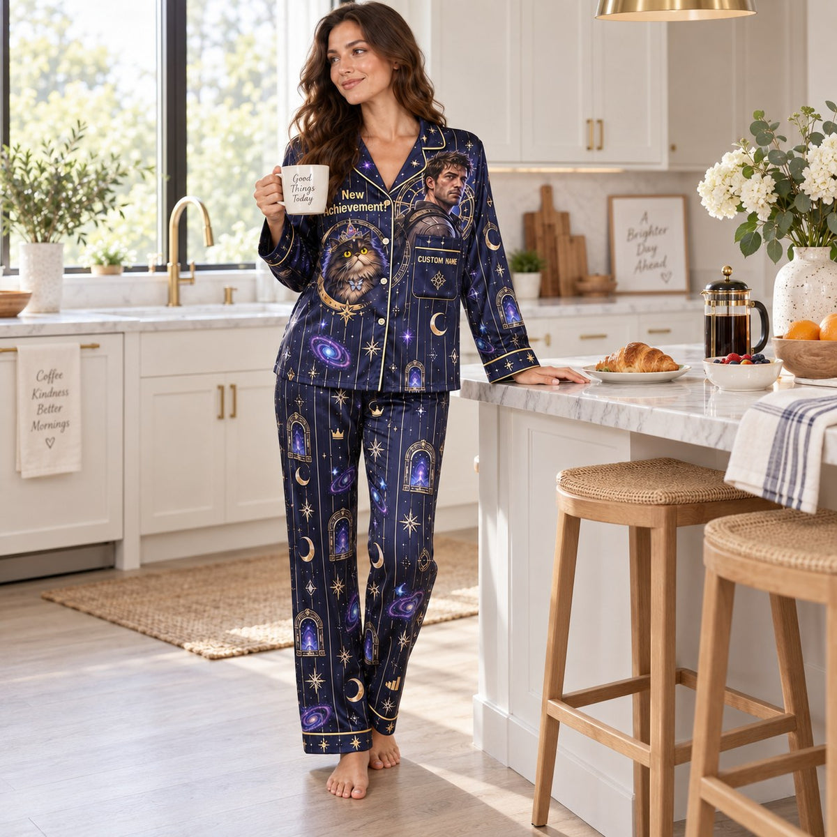 woman reading a book in matching galaxy print satin pajamas