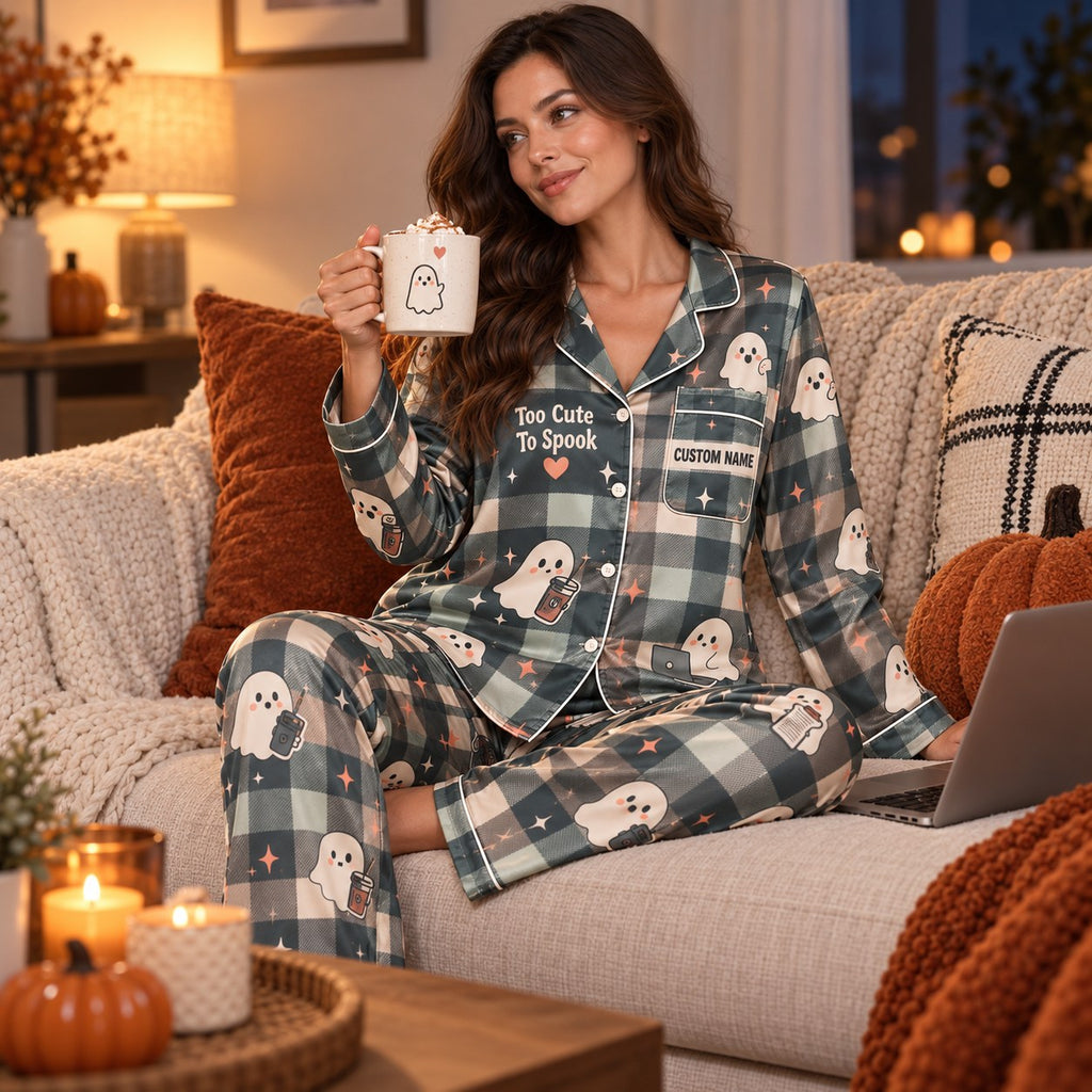 lifestyle shot of woman relaxing in custom name plaid ghost Halloween pajama