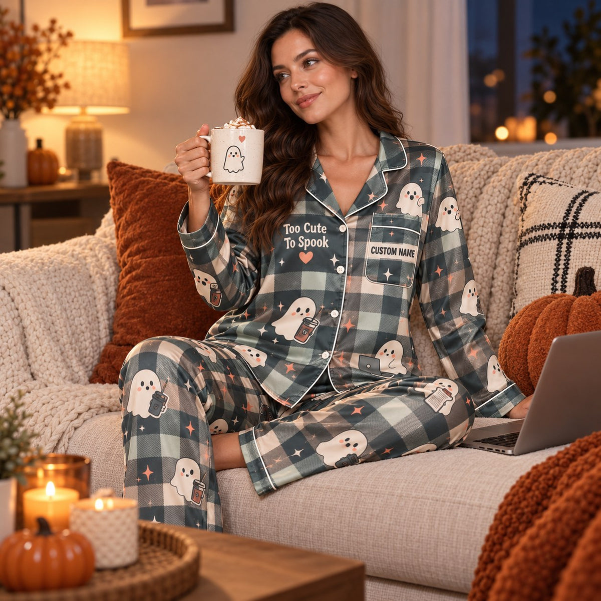 lifestyle shot of woman relaxing in custom name plaid ghost Halloween pajama