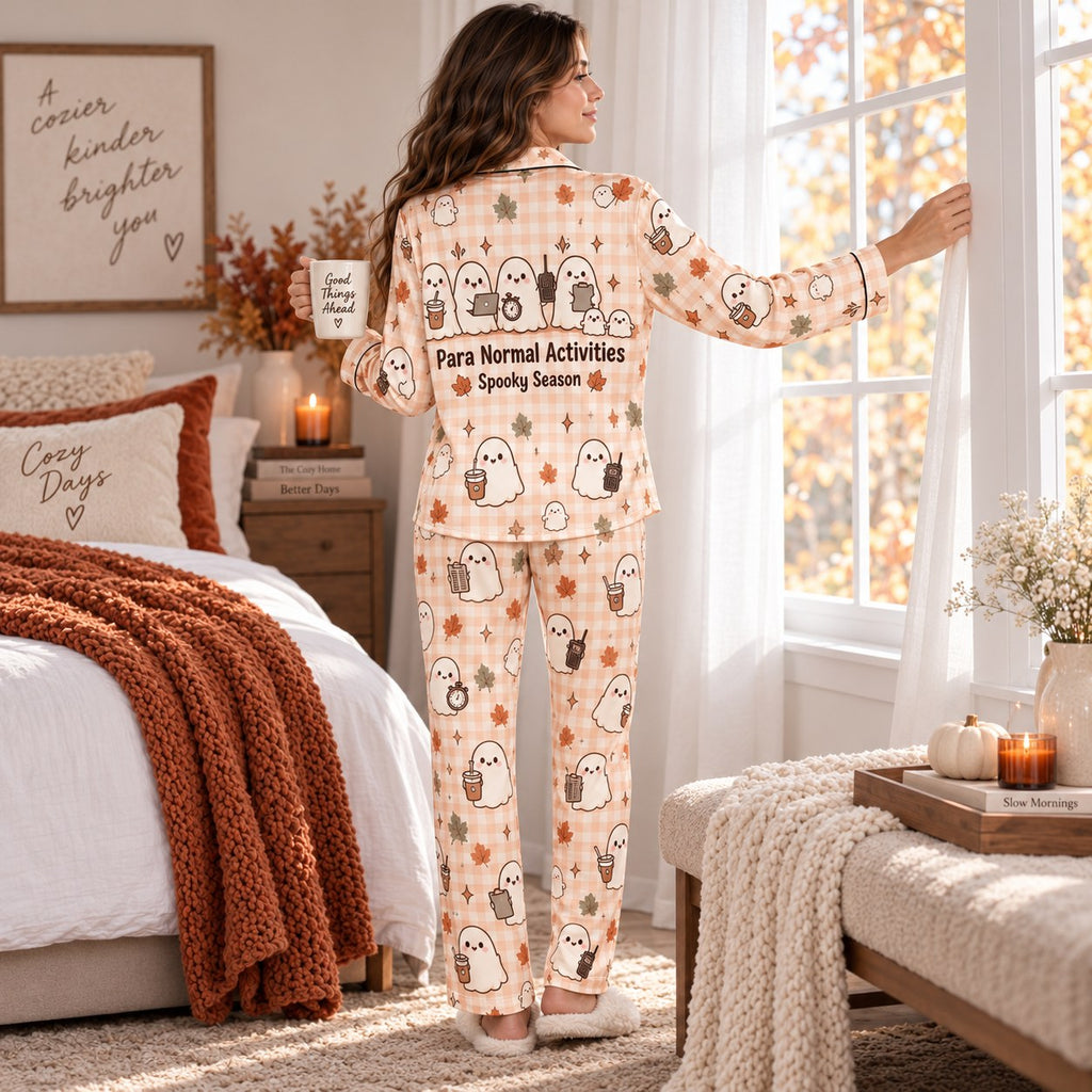 cute ghost halloween pajamas styled with a knit throw and a pumpkin