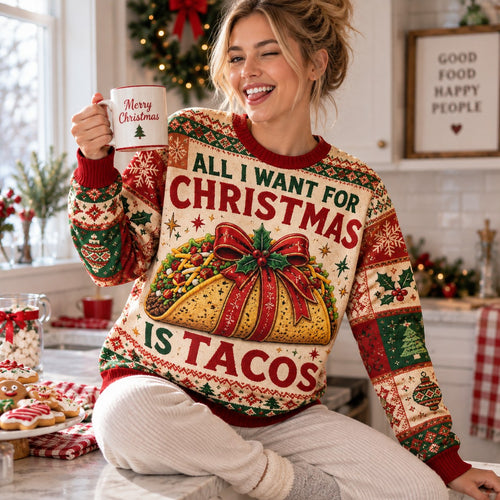 woman holding a merry christmas mug while wearing a festive taco-themed christmas