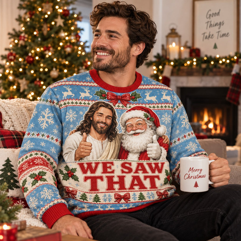 smiling man in a we saw that holiday sweater holding a merry