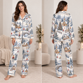 satin pajama set with all over winter village christmas print worn