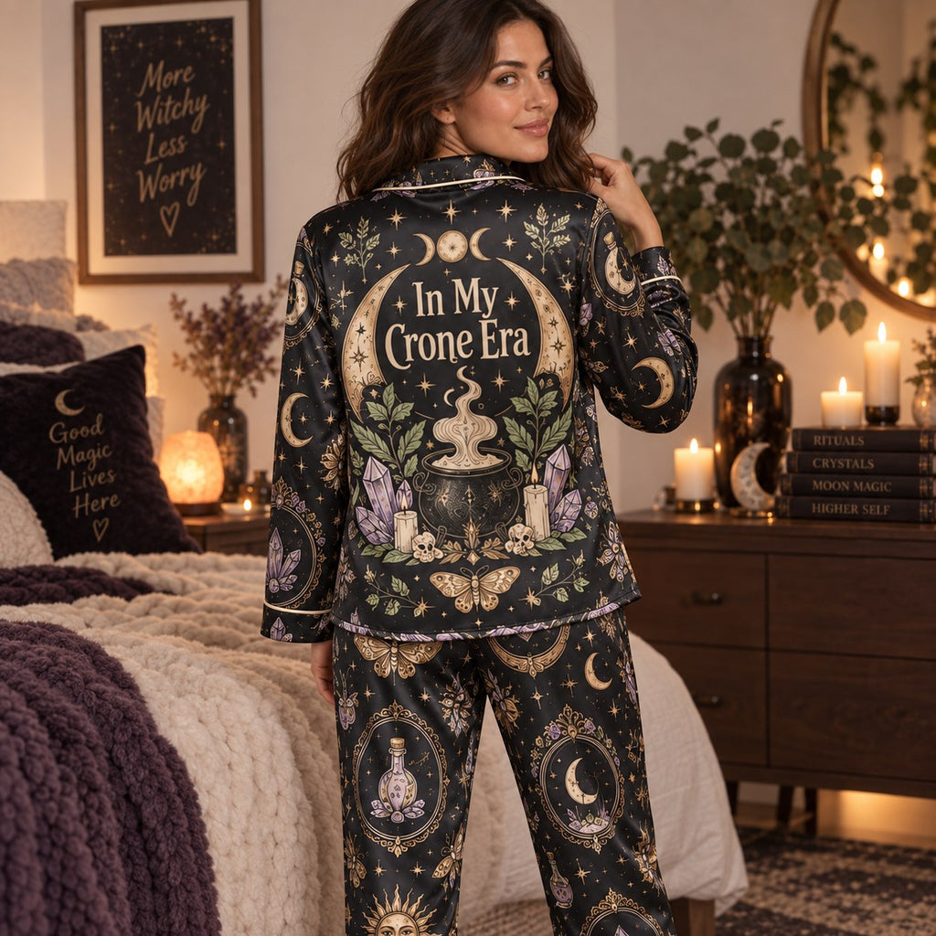 woman stretching in witchy woman halloween satin pajama set in bedroom