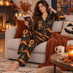 model holding a pumpkin mug while wearing witchy woman halloween pajamas