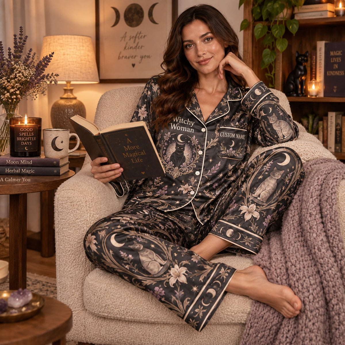 witchy woman personalized satin pajama set on a chair with a book