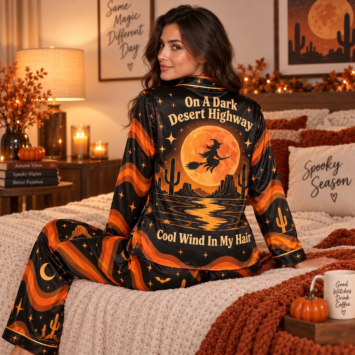 woman standing by window in witchy woman halloween pajama set, back view