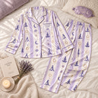 lavender striped yoga satin pajamas flat lay with a custom name on the chest