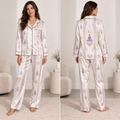 woman modelling front view of lilac and gold satin pajama set